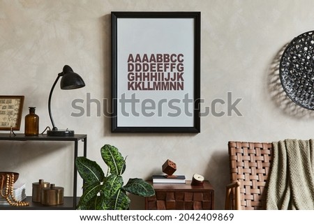 Creative interior composition of elegant masculine living room design with mock up poster frame, brown armchair, industrial geometric shelf and personal accessories. Template.