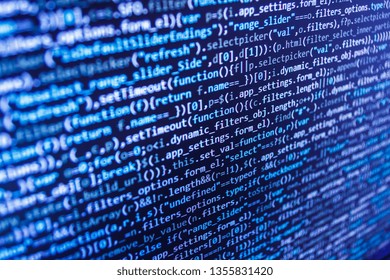 Creative Js HTML5 closeup set on background. Web development work concept. Abstract screen of software virus and coding technologies. Application binary code. Source PC website developer. 