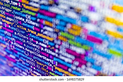 Creative Js HTML5 closeup set on background. Shallow depth of field effect. Abstract technological background with digits and lines. Future technology creation process.  