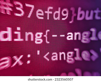 Creative Js HTML5 closeup set on background. Programmer typing new lines of HTML code. Screen of web developing javasc. Developing programming binary code