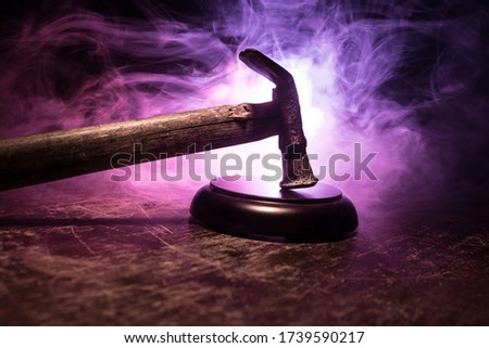 Creative Justice artwork concept. Old vintage hammer on the soundboard block. Steel hummer instead Judge Gavel on wooden background.