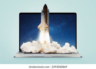 Creative laptop and rocket with smoke and blast lift off up, creative idea. Boosting applications and workflows, concept. Launching the shuttle spaceship from a laptop. Startup and rapid growth