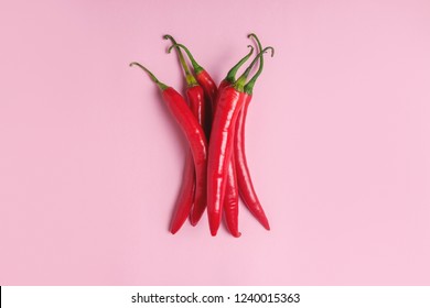 Creative layout of chili pepper on pink background. Minimal food concept. - Powered by Shutterstock