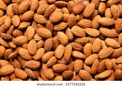 Creative layout made of almond nuts. Flat lay. Food concept. Almond pattern concept.