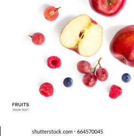 Creative layout made of apple, raspberry, grape and blueberry. Flat lay. Food concept. 