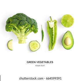 Creative layout made of avocado, lime, broccoli, green pepper, cucumber, chilli pepper and zucchini. Flat lay. Food concept. Green vegetables isolated on white background. - Powered by Shutterstock