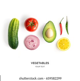 Creative layout made of avocado, onion, tomatoes, pepper and lemon. Flat lay. Food concept. Vegetables isolated on white background. - Shutterstock ID 659582299