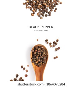 Creative layout made of black pepper and wood spoon on a white background. Top view.   - Powered by Shutterstock