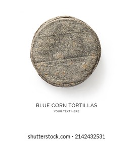 Creative Layout Made Of Blue Corn Tortilla On The White Background. Flat Lay. Food Concept. Macro  Concept.