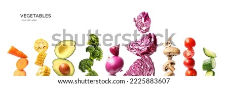 Creative layout made of cabbage, avocado, tomato, onion, broccoli , mushrooms, corn, carrot and cucumber on the white background.. Flat lay. Food concept. 
