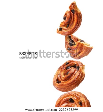 Creative layout made of cinnamon buns on the white background. Flat lay. Food concept. Sweets and Pastry.