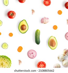 Creative Layout Made Of Cucumber, Tomato, Garlic, Onion, Avocado And Cabbage On The White Background. Flat Lay. Food Concept.