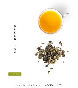 Creative layout made of cup of green tea on a white background. Top view