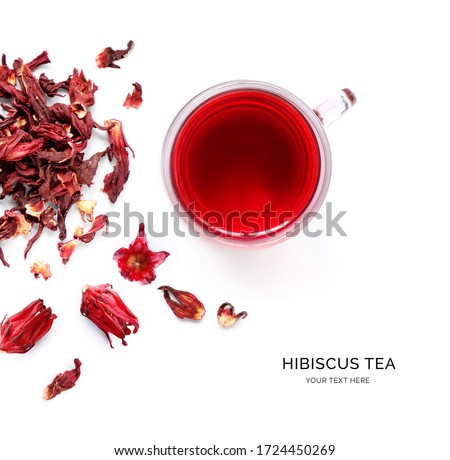 Creative layout made of cup of hibiscus tea  on a white background. Top view.