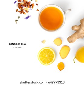 Creative layout made of cup of hot tea with ginger and lemon on a white background. Top view.