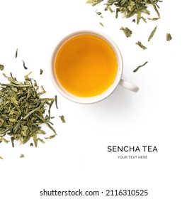 Creative layout made of cup of sencha tea on the white background. Flat lay. Food concept.