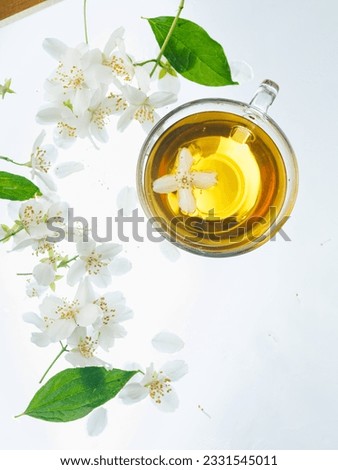 Creative layout made of cup of tea, green tea, black tea, fruit and herbal, tea, turmeric, ginger on white background.Flat lay. Food concept.
