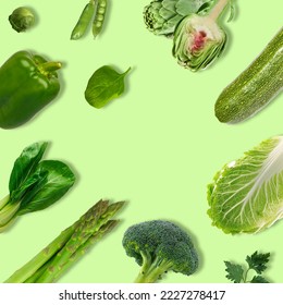 Creative layout made of different green vegetables. The concept of fresh and raw food. Flat lay.
