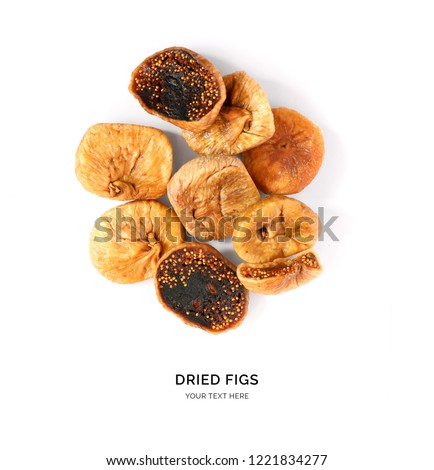 Creative layout made of dried figs on white background.Flat lay. Food concept.