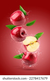 Creative layout made from Fresh Red apple and water splashing on the red background