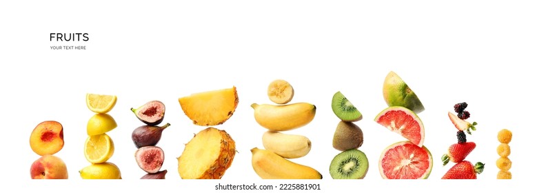 Creative layout made of fruits. Flat lay. Strawberry, figs, peach, grapefruit, pineapple, lemon, kiwi, raspberry, kiwi and blackberry on the white background.