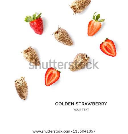 Creative layout made of gold strawberry on the white background.  Tropical flat lay. Food concept.