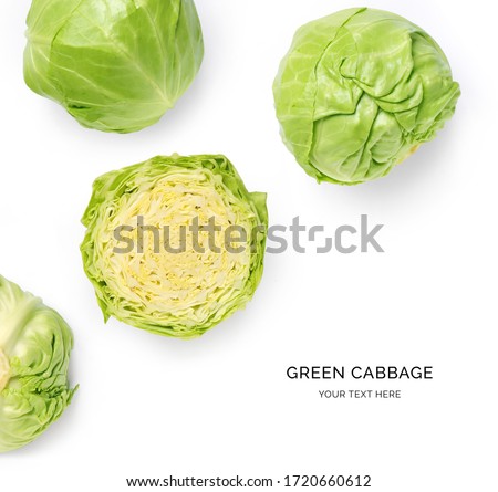 Creative layout made of green cabbage on a white background. Top view.