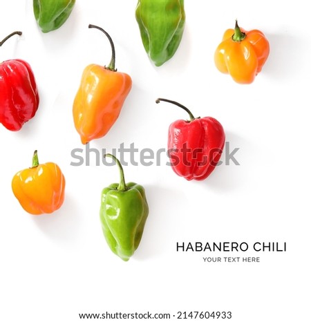 Creative layout made of habanero chili on white background. Flat lay. Food concept. 