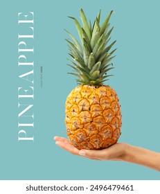Creative layout made of hand holding a pineapple on the blue background. Food concept. Macro concept.
