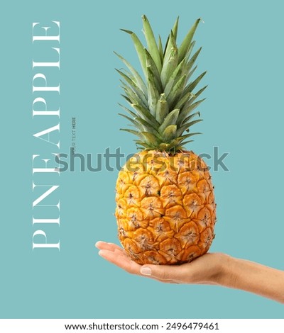 Creative layout made of hand holding a pineapple on the blue background. Food concept. Macro concept.