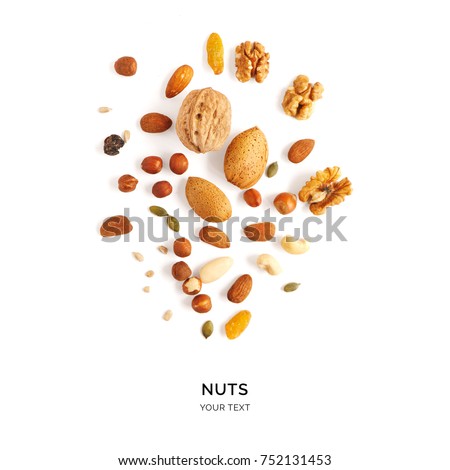 Creative layout made of hazelnut nuts, almonds, walnut, peanut, cashew on white background.Flat lay. Food concept.