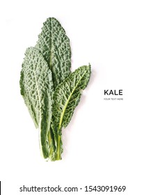 Creative layout made of kale on white background. Flat lay. Food concept. Macro concept.