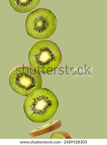 Creative layout made of kiwi fruit on the green background. Food concept. Macro concept.