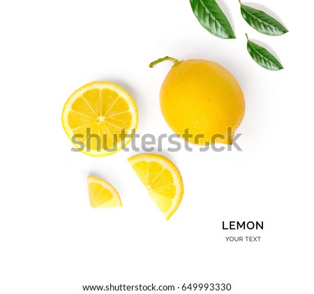 Creative layout made of lemon and leaves. Flat lay. Food concept. Lemon on white background.
