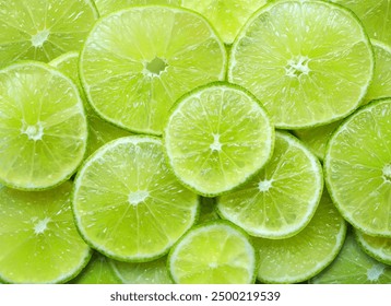 Creative layout made of lime fruit. Flat lay. Food concept. Lime pattern concept.