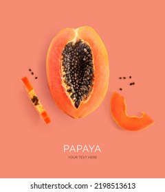 Creative layout made of papaya on the orange background. Flat lay. Food concept. Macro  concept.  