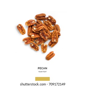 Creative layout made of pecan nuts on white background.Flat lay. Food concept.