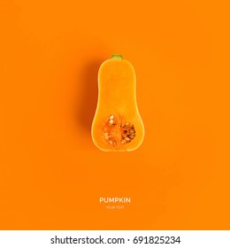 Creative Layout Made Of Pumpkin On The Orange Background. Flat Lay. Food Concept.