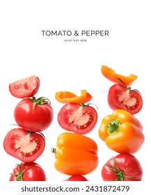 Creative layout made of red tomato and orange bell pepper on the white background. Flat lay. Food concept. Macro concept.