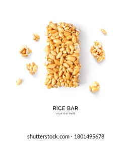 Creative layout made of a rice bar on the white background. Flat lay. Macro concept.	