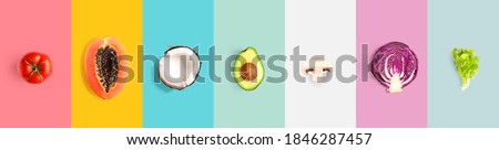Creative layout made of tomato, papaya, coconut, avocado, champignon, cabbage and salad. Flat lay. Food concept. Macro  concept.