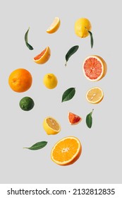 Creative layout made of various fresh fruits, slices and leaves. Minimal flying Summer concept on gray background. Abstract food idea. - Shutterstock ID 2132812835