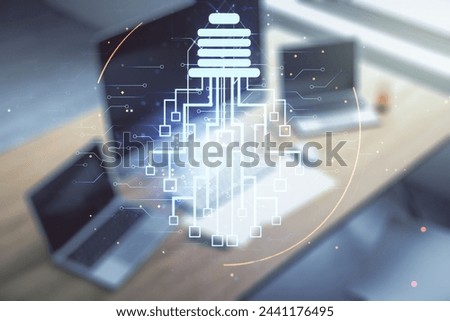 Creative light bulb illustration with microcircuit and modern desktop with pc on background, future technology concept. Multiexposure