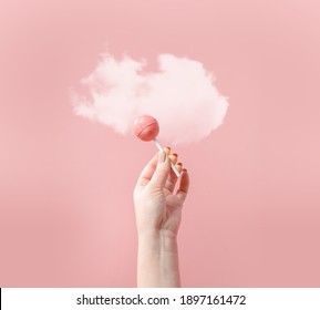 Creative lollipop composition on pastel background