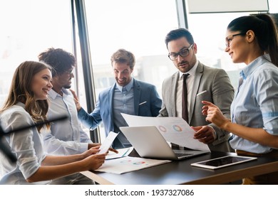 Creative managers crew working with new startup project in office. Team brainstorming. - Powered by Shutterstock