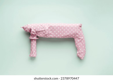 Creative men's gift concept. Electric drill wrapped in pink polka dot gift paper on a blue pastel background.  - Powered by Shutterstock