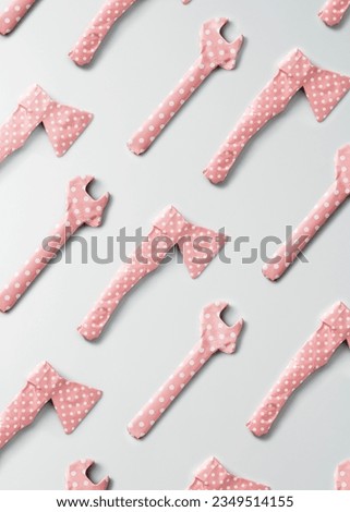 Creative men's gift concept. Pattern of men's tools wrapped in pink gift paper.  