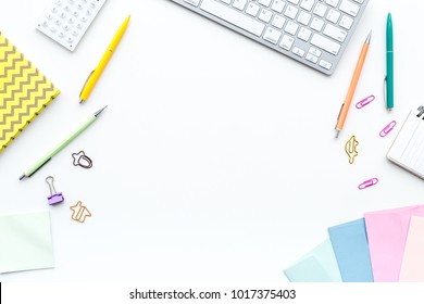 Creative Mess On Student's Desk. Keyboard, Notebook, Stationery, On White Background Top View Copy Space