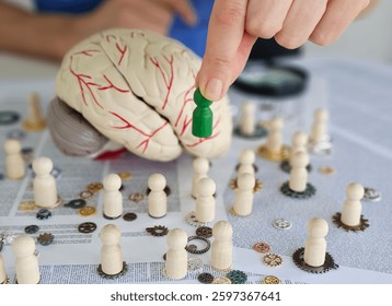 Creative minds at work exploring cognitive functions with brain models and wooden figures