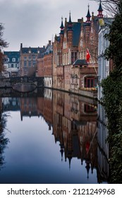 Creative mirroring of the houses on the Groenerei canal, from the Meestraat bridge. Photo taken on 25th of January 2022 in Bruges, Provinces of West Flanders, Belgium.